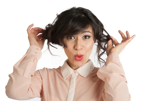 A woman holds hands hair — Stock Photo, Image