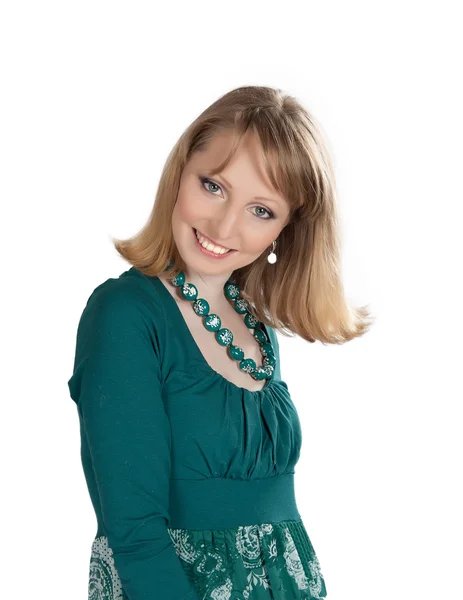 Piękno portret blondynka w zielonej sukience — Zdjęcie stockowe