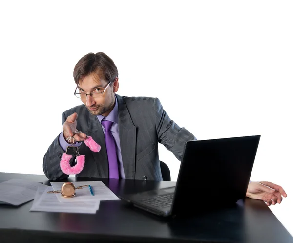 Man holding a pink handcuffs — Stock Photo, Image