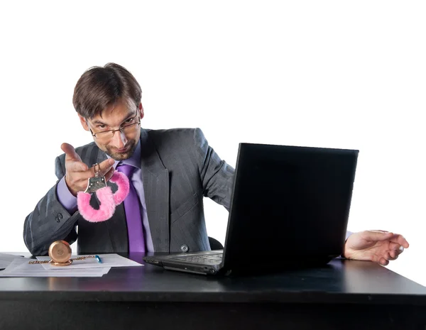 Man holding a pink handcuffs — Stock Photo, Image