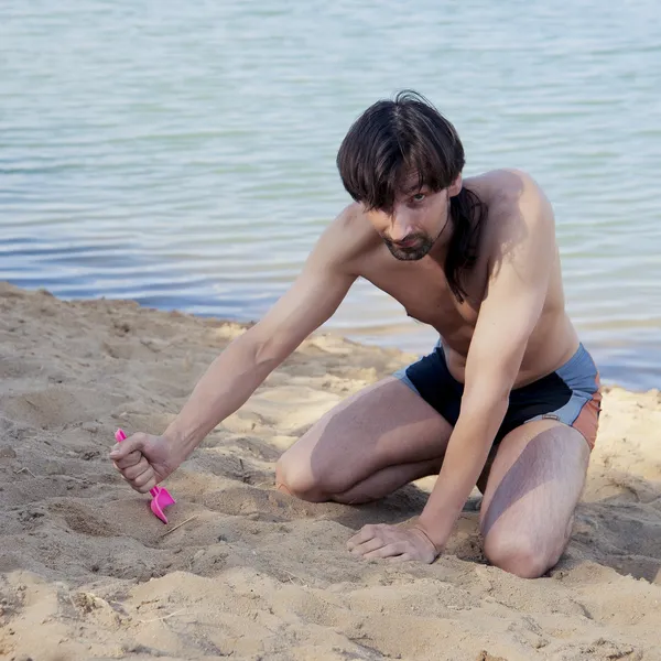 Uomo sulla spiaggia — Foto Stock