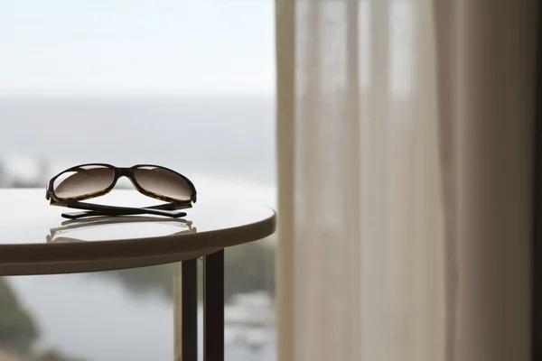 Contemporary apartment with sunglasses and view — Stock Image Contemporary apartment with sunglasses and view Royalty Free Stock Photos