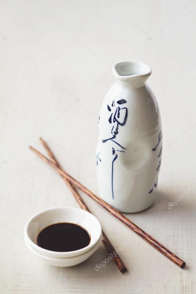 white japanese bottle soy sauce and chopsticks