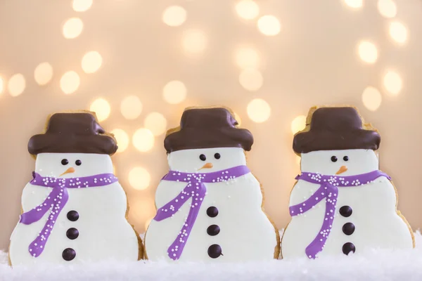 Galletas de muñecos de nieve con luces — Foto de Stock