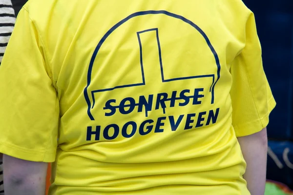 Back of t shirt employee of Sonrise, an interdenominational community in Hoogeveen, Netherlands
