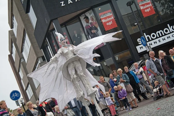 Hoogeveen, Netherlands: August 18, 2011 - Close up of winged lady who is part of the street theater group Close-Act, Hoogeveen, Netherlands — Stock Photo, Image