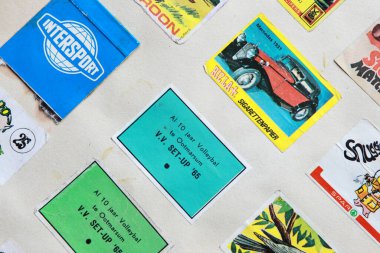 Hoogeveen, The Netherlands- September 9, 2022: Pictures of old matchboxes in a scrapbook, The Netherland