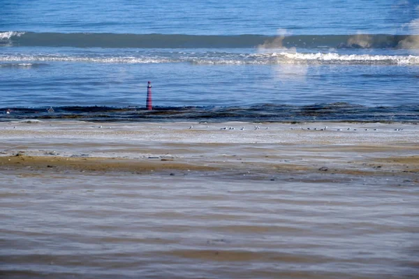 Schiermonnikoog Holandia Września 2022 Podwójny Strzał Plaża Morza Północnego Latarnią — Zdjęcie stockowe