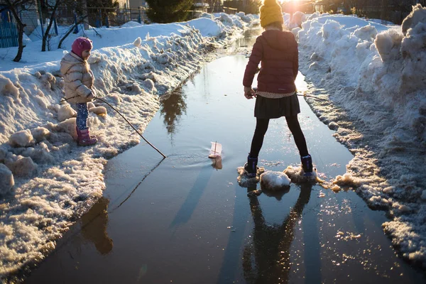 Children Play Puddle Street Early Spring Snow Melting Road Weather — Stock Photo, Image