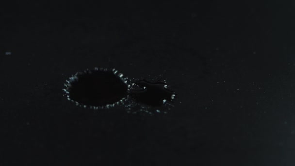 Slow Motion Drops Splashing Dark Background — Stock Video