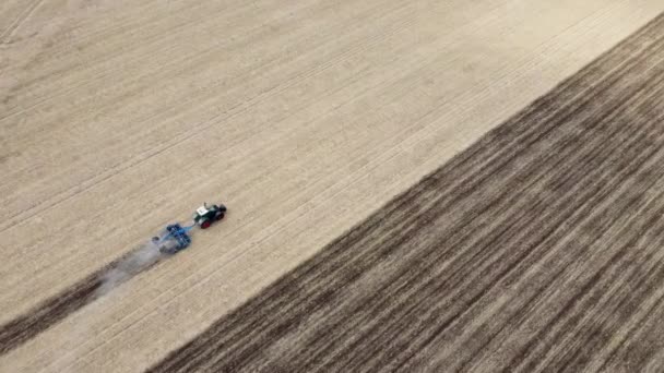 Tractor Harrows Wheat Field Very Dry Summer Season Aerial View — Stockvideo