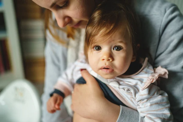 Small Caucasian Baby Hands Her Mother Sitting Looking Camera Real — Stock Photo, Image