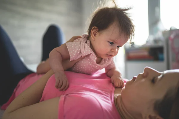 Young Adult Caucasian Mother Playing Her Four Months Old Baby — Stock Photo, Image