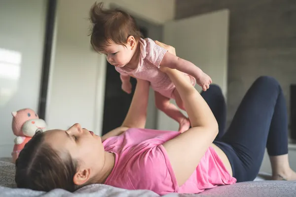 Young Adult Caucasian Mother Playing Her Four Months Old Baby — Stock Photo, Image