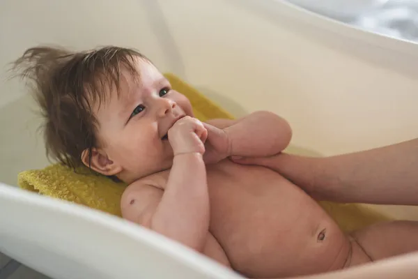 Small Caucasian Baby Taking Bath Home Unknown Woman Mother Holding — Stock Photo, Image