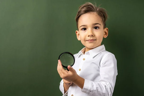 One Boy Front Green Background Wall Holding Lens Magnifying Glass — Fotografia de Stock