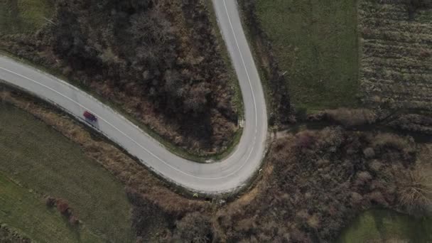 Car Aerial View Top Country Road Mountain Range Fields Grass — стокове відео