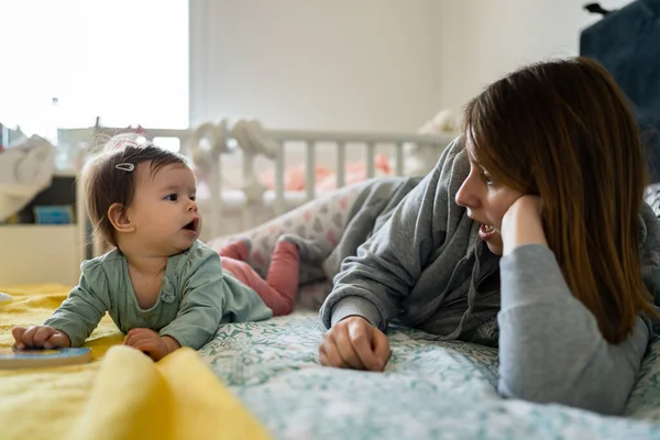 Front View Happy Small Caucasian Baby Lying Bed Playing Book — Stock Photo, Image