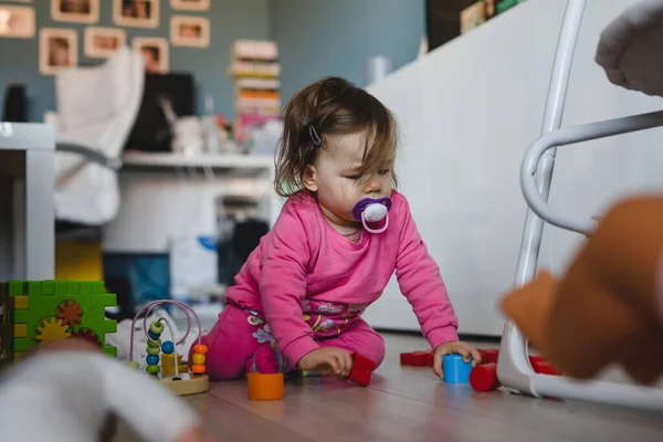 One Small Caucasian Baby Girl Ten Months Old Playing Alone — Stock Photo, Image