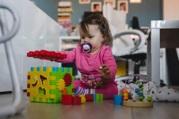 One Small Caucasian Baby Girl Ten Months Old Playing Alone — Stock Photo, Image