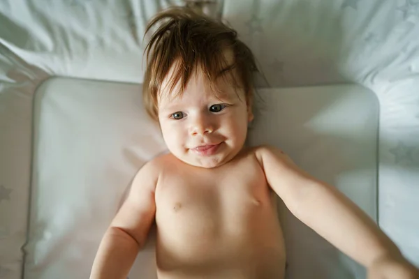 One Happy Small Caucasian Baby Naked Lying Bed Looking Camera —  Fotos de Stock