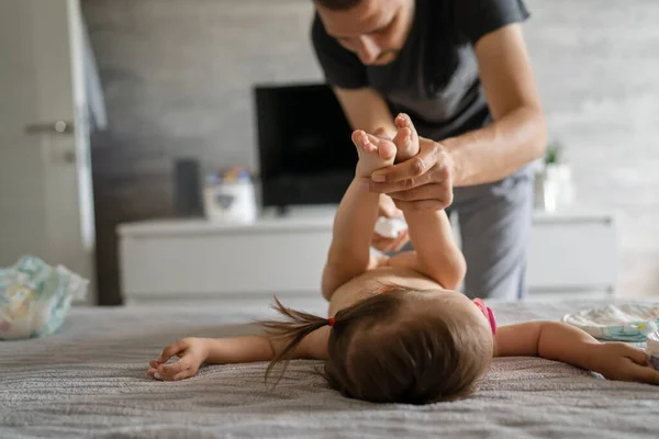Father Changing Diapers His Daughter Toddler Girl Home Bedroom Early — Stock Photo, Image