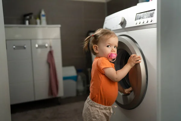 One Girl Small Caucasian Toddler Child Daughter Standing Washing Machine Stockbild