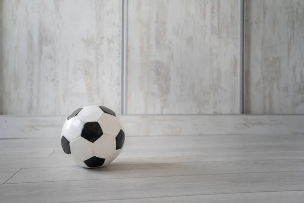 one football ball on the floor at home copy space nobody against background