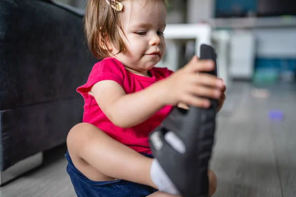 One Caucasian Toddler Girl Child Playing Slippers Home Room Alone — Stock Photo, Image