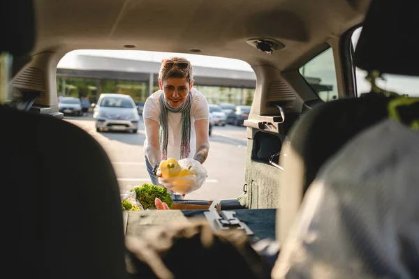 One Woman Mature Caucasian Female Putting Box Vegetables Back Her — Fotografia de Stock