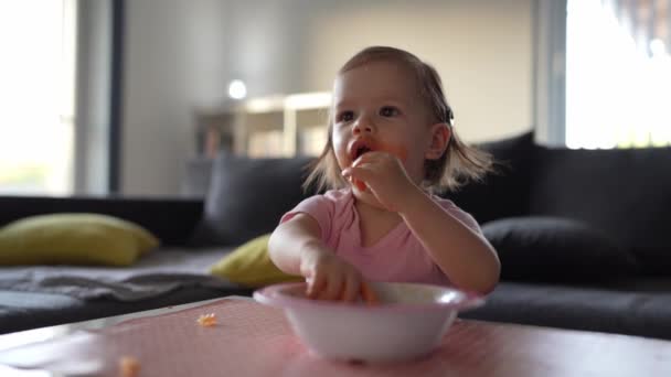 One Girl Small Caucasian Toddler Female Child Daughter Eating Alone — Vídeo de Stock