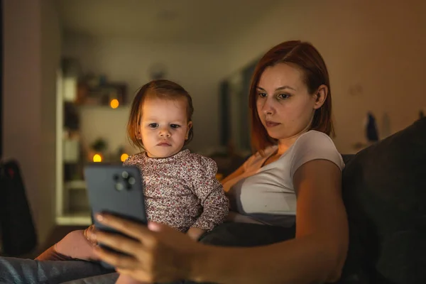 Small Caucasian Child Little Girl Toddler Mother Daughter Sitting Dark — Fotografie, imagine de stoc