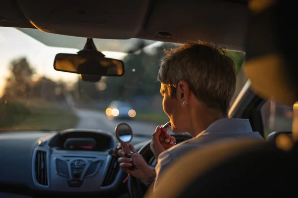 One Woman Mature Caucasian Female Businesswoman Sitting Car Putting Lipstick — ストック写真