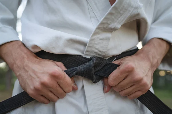 Close Hands One Man Unknown Karateka Holding Karate Black Belt — Foto de Stock