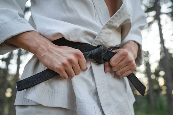 Close Hands One Man Unknown Karateka Holding Karate Black Belt — Stock fotografie