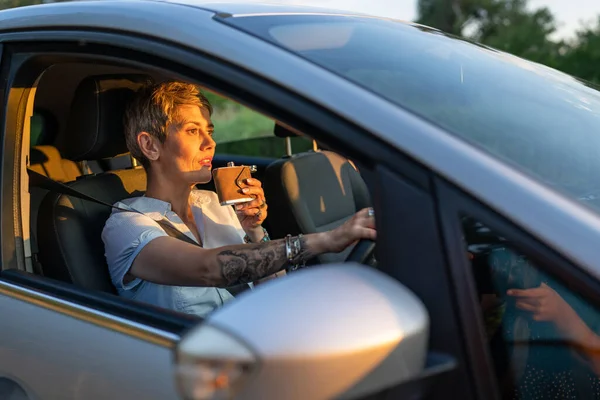 One Woman Mature Caucasian Female Tattoo Arms Hold Flask While — Stockfoto