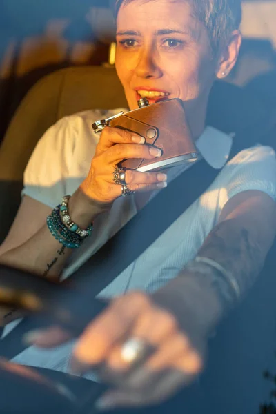 One Woman Mature Caucasian Female Tattoo Arms Hold Flask While — Stock fotografie