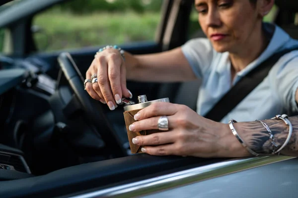 Close Hands Caucasian Woman Holding Flask While Sitting Car Drunk — 스톡 사진