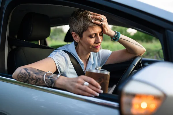 One Woman Mature Caucasian Female Tattoo Arms Hold Flask While — Foto Stock