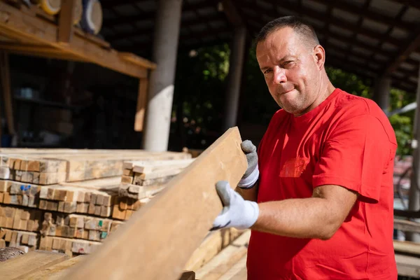 One Man Caucasian Adult Male Standing Warehouse Checking Wooden Plank — Fotografia de Stock