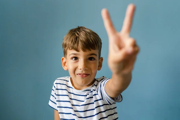 One Caucasian Boy Child Front Blue Wall Home Goofing Indoor — Stock Photo, Image