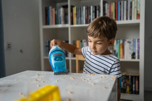 One Preschooler Boy Cleaning Mess Table Hand Vacuum Cleaner Playing — Stock Photo, Image