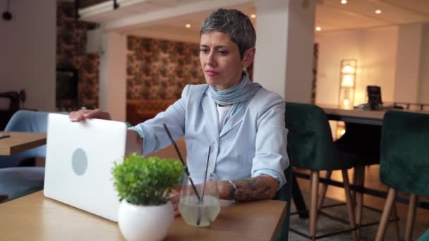 One Woman Stretching While Sit Cafe Table Laptop Computer Taking — Stock Video