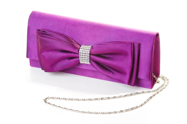A purple clutch with bow — Stock Photo, Image