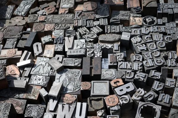 Old die press letters and numbers Stock Picture