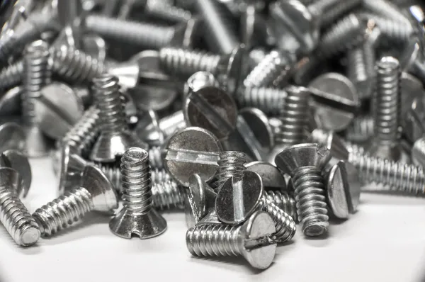 Macro shot of screws on white — Stock Photo, Image