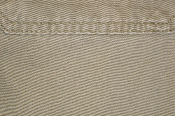 Denim beige primer plano fondo —  Fotos de Stock