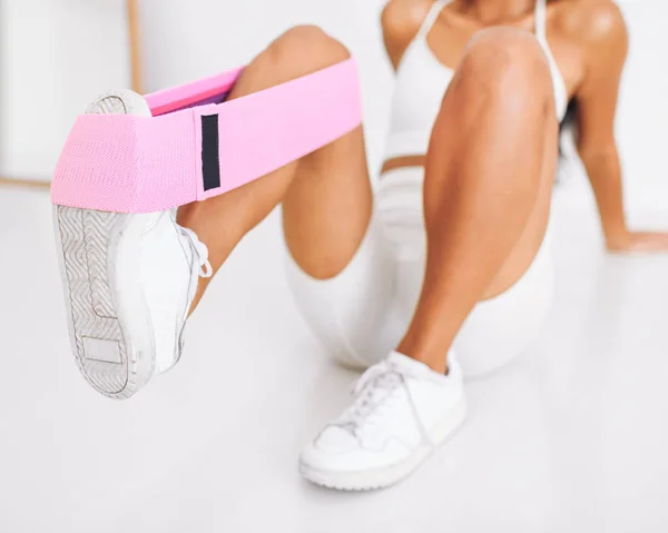 Girl Legs Doing Exercises Resistance Band Made Fabric Focus Produc — Stock Photo, Image