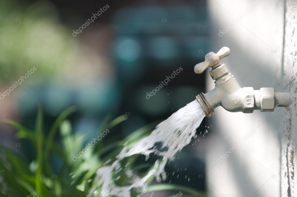 A spigot sprays water everywhere
