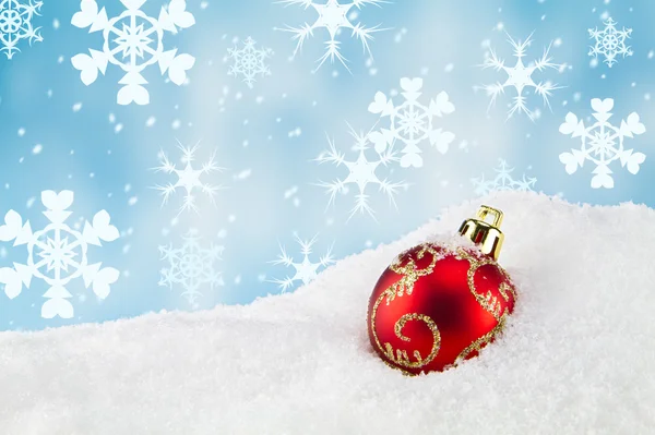 Christmas bauble in the snow — Stock Photo, Image